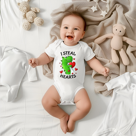 I Steal Hearts | Baby Onesie - Kim’s Signature Beauty & Accessories    (Store description)